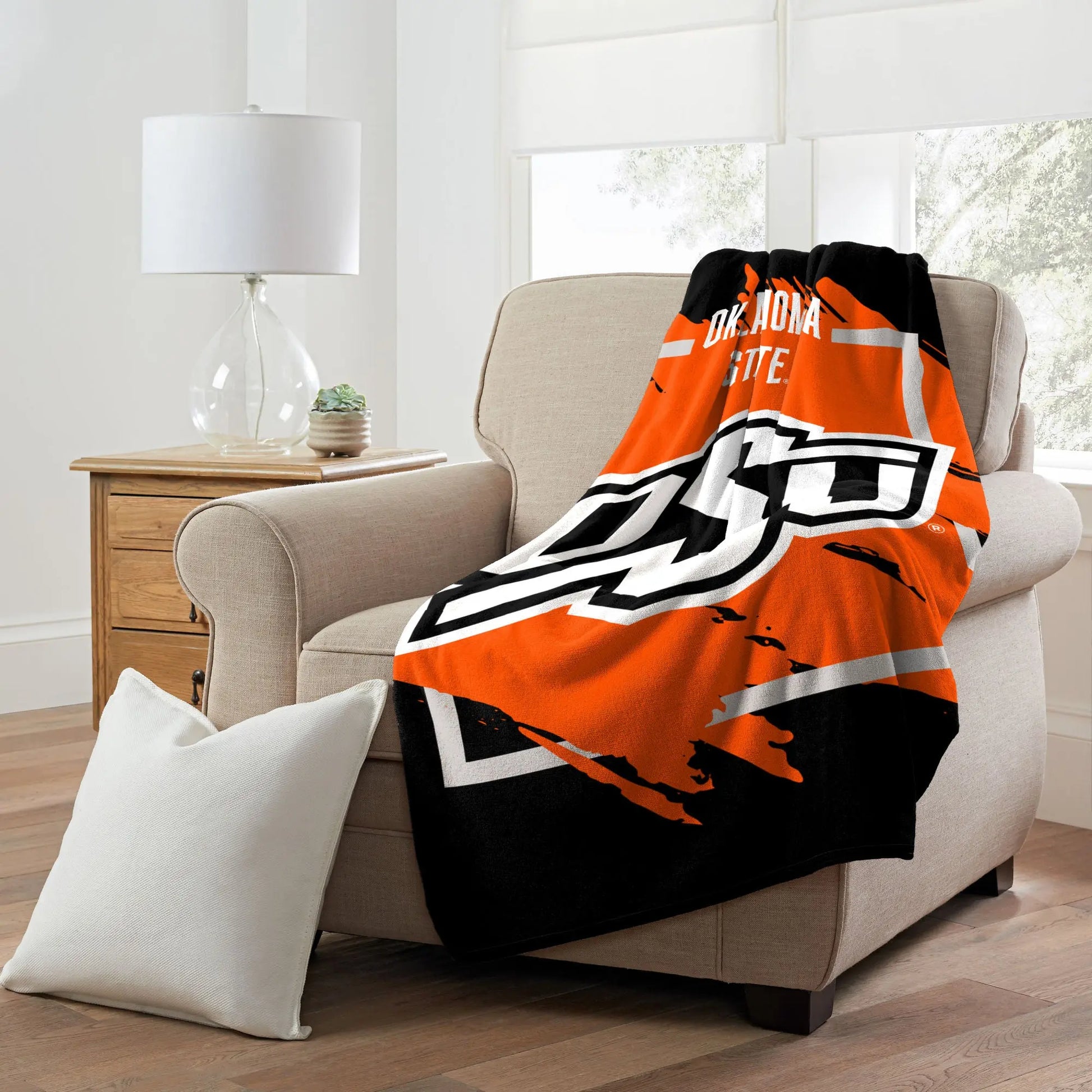 OKLAHOMA STATE OFFICIAL NCAA "Halftone" Micro Raschel Throw Blanket; 46" x 60" The Northwest Company